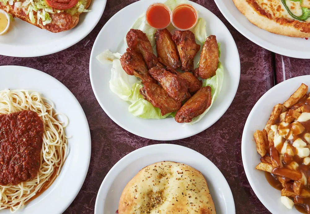 New Pizza Factory takeout - hand-tossed pizza and chicken wings combo ready for pickup in southeast Edmonton