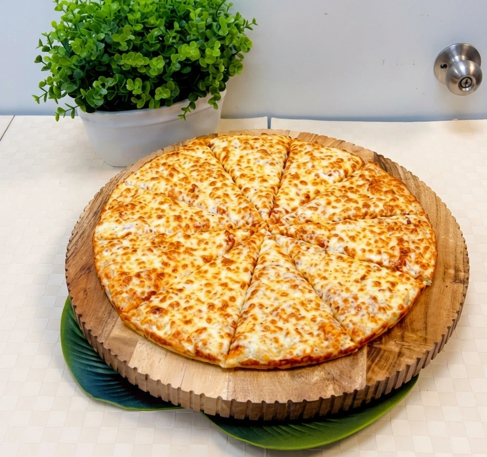 Classic pepperoni and cheese pizza at New Pizza Factory Edmonton